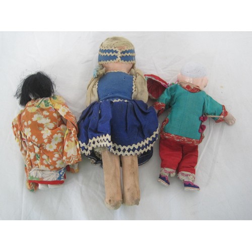 328 - Three vintage dolls of children in traditional costume, the tallest 22cm, some a/f