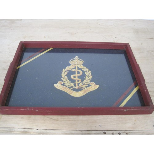 372 - A Royal Army Medical Corps hand painted badge forming the base of a tray, in good order.