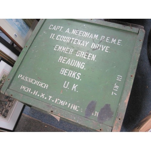 373 - A vintage wooden travel trunk marked for Captain A Needham Reme to top, in good solid order, labelle... 