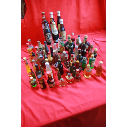 379 - A large quantity of vintage alcoholic miniatures, sealed