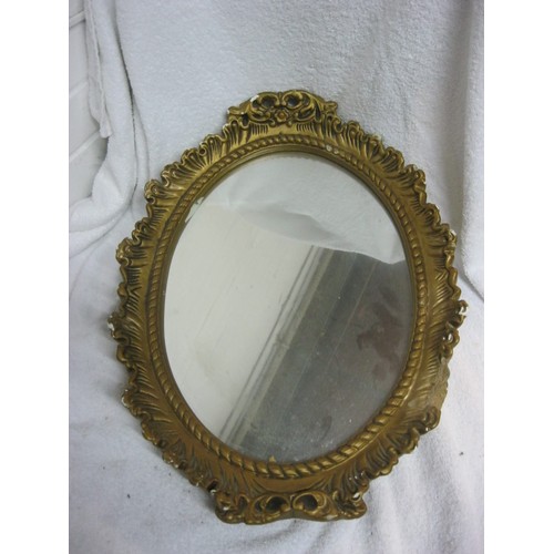 403 - An antique mirror with gilded plaster frame