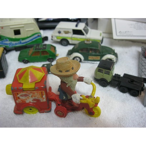 396 - An assortment of die cast vehicles including Corgi, and a boxed and mint Matchbox 'Santa's Fire Engi... 