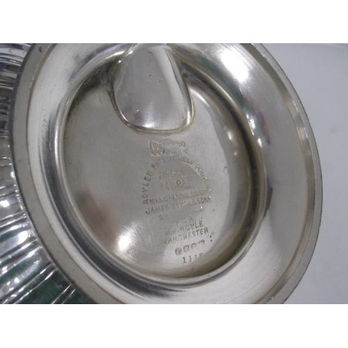 21 - A patent silver plated  self pouring teapot manufactured by James Dixon and sons Sheffield .