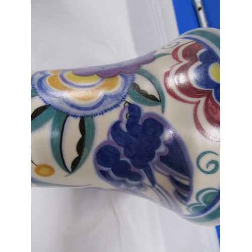 100A - A Poole pottery shape 596 trumpet vase in the HE Bluebird  pattern.
Quite a substantial vase at just... 