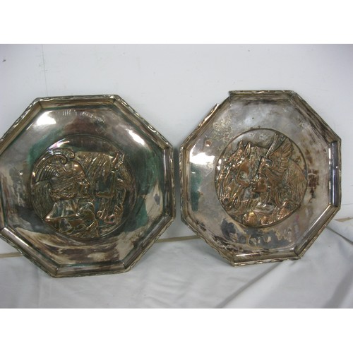 175 - A pair of Nordic silver plated plaques featuring a warrior to the centre, slight a/f to some edges