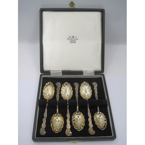 195 - Cased set of six Silver Gilt Teaspoons with shell shaped bowls and ornate handles London 1893 73gm