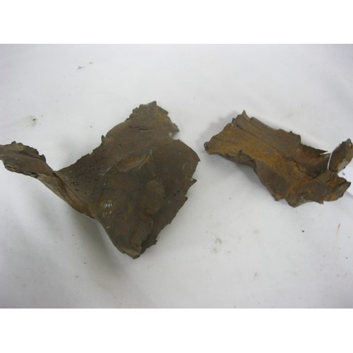 215 - 410 Two large pieces of WW1 shrapnel from the Verdun battlefield. Total approximate weight 1.5kgs