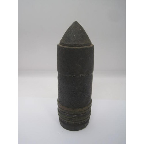 217 - An inert WW1 artillery shell head. Overall height 14.5cms by 4.5cms diameter with a weight of 1.65kg... 