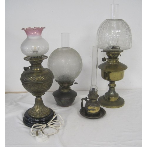 21 - Three oil lamps (two of which have etched glass shade, Maple Hinks Patent and Messenger No. 2), and ... 