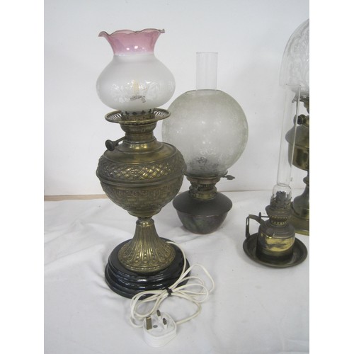 21 - Three oil lamps (two of which have etched glass shade, Maple Hinks Patent and Messenger No. 2), and ... 