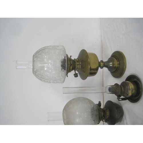 21 - Three oil lamps (two of which have etched glass shade, Maple Hinks Patent and Messenger No. 2), and ... 