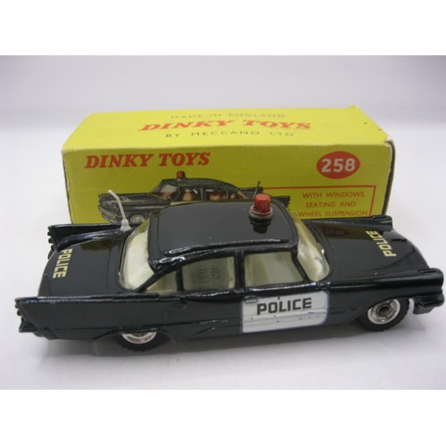 38 - A Dinky Toys #258 USA Police Car (DeSoto Fireflite), minor marks but very good throughout, with ligh... 