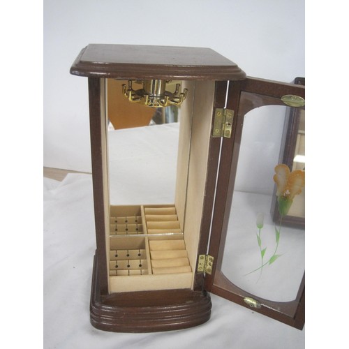 64 - Two glazed wooden jewellery boxes - the taller at 30cm with a mirrored back interior. The other with... 