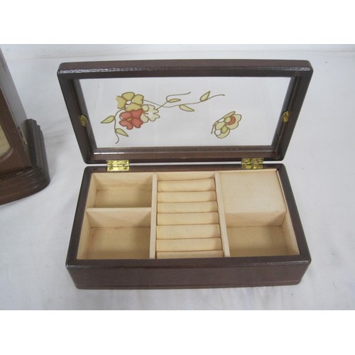 64 - Two glazed wooden jewellery boxes - the taller at 30cm with a mirrored back interior. The other with... 