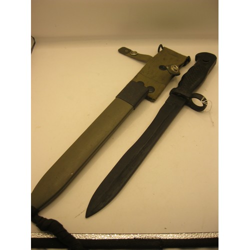 90 - A Spanish M1964 (CETME Model C) bayonet in its plastic scabbard. The ricasso is stamped with the Tol... 