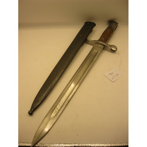 94 - A Swiss Model 1889 bayonet for the 1889 & 1911 Schmidt-Rubin rifle in its steel scabbard. Makers nam... 