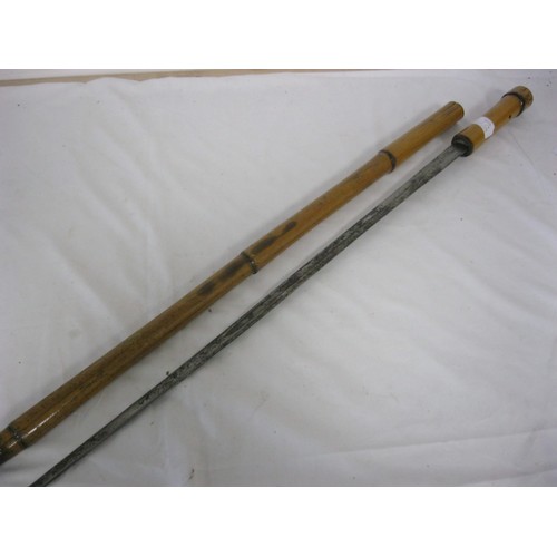 99 - A bamboo shafted sword stick with a 72.5cms single edged sword blade, with an overall length of 92cm... 