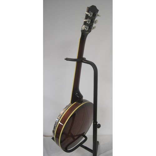 168 - An Ozark banjo, 6 string, with stand, in good order