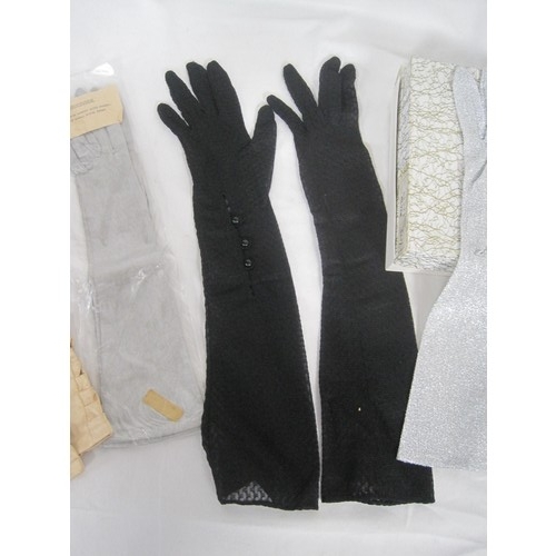 138 - Four pairs of ladies evening gloves, in a cardboard presentation box