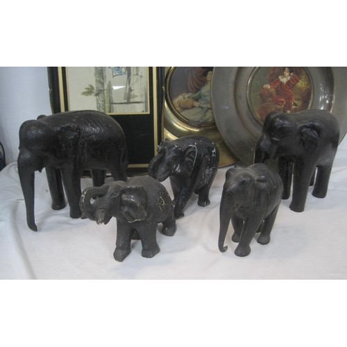 135 - Two Trafford 'Old Masters' plaques, five wood and stone figures of elephants, a decorative tray with... 