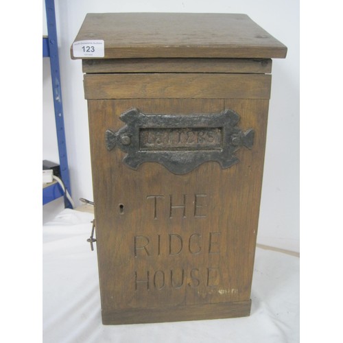 123 - A stained wood letter box standing at 50cm, carved to the front 'THE RIDGE HOUSE'