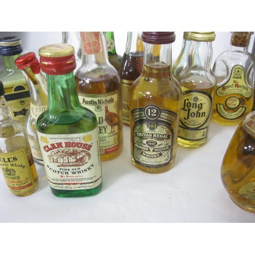 207 - An assortment of vintage whiskey miniatures including Dimple Haig and others, probably approaching 5... 