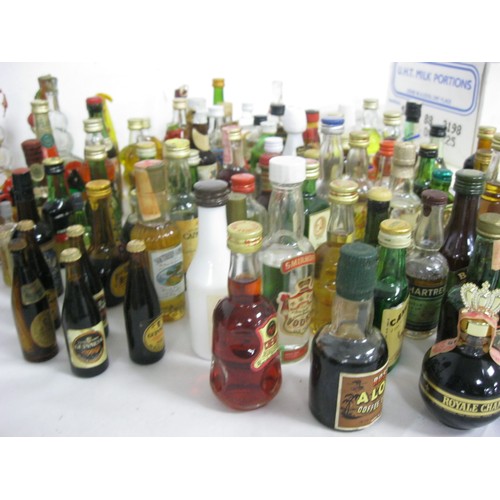 208 - A large assortment of alcoholic miniatures as per the photographs