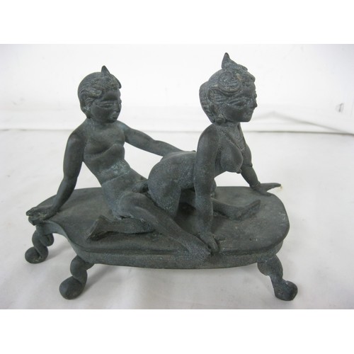 25 - A cast bronze Hindu erotic figure featuring a couple copulating, explicit, likely late 19th or early... 