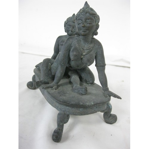 25 - A cast bronze Hindu erotic figure featuring a couple copulating, explicit, likely late 19th or early... 