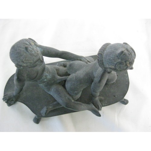 25 - A cast bronze Hindu erotic figure featuring a couple copulating, explicit, likely late 19th or early... 