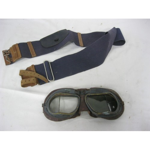 5 - A pair of WW2 Mark VIII RAF pilot's goggles with angled eye-pieces, metal framed with leather paddin... 