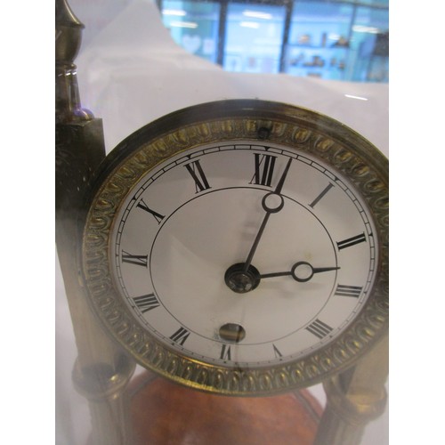 18 - A possibly French portico style dome cased pendulum clock .
Clock need a service but is otherwise in... 