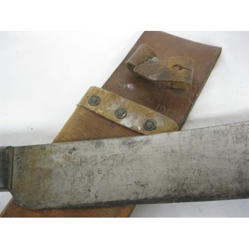 66 - (473) A British Army 1956 dated Martindale No.227 machete in a 1944 dated leather scabbard. Both the... 