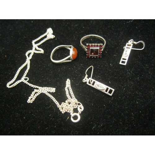 44 - Two silver and white metal dress rings, a 925 necklace, and a pair of 925 earrings. (1) A London ass... 