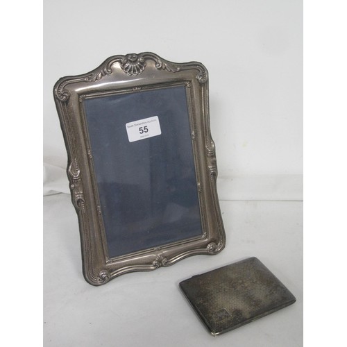 55 - An electroplated engine turned cigarette case, and a silver-plated photograph frame, about 25cm x 18... 