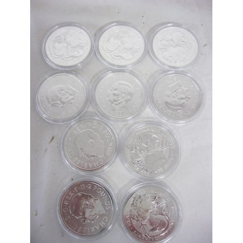 9 - 10 x .999 fine silver 1 ounce Britannia coins, encapsulated and in bright uncirculated condition, al... 