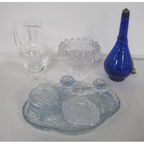 24 - Assorted glass ware - a matched part dressing table set, stoppered scent bottle, a Stuart jug, a Kos... 