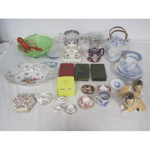 26 - A mixed box of China and porcelain items to include Miniature cups and saucers, Carlton ware Lobster... 