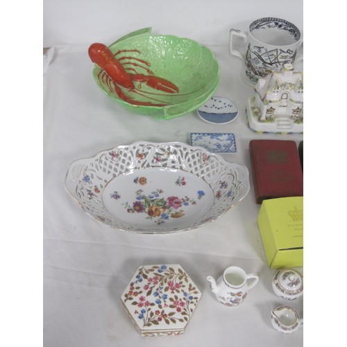 26 - A mixed box of China and porcelain items to include Miniature cups and saucers, Carlton ware Lobster... 