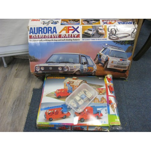 230 - An Aurora AFX Daredevil Rally large car racing set with 4 cars, plus a continental Meccano-like kit ... 