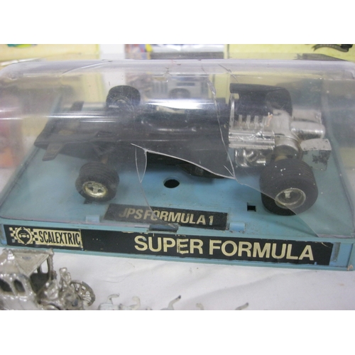 49 - A small assortment of boxed die cast toy cars plus a Scalextric JPS Lotus in plastic case, a/f