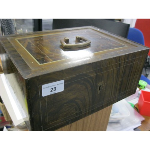 28 - Metal strongbox 10 by 8 by 5inches tall finished in a wood effect close to a dark walnut .
Sadly no ... 