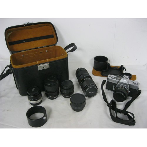 57 - A Minolta SRT-101 35mm SLR Camera in fitted hard case with a selection of extra lenses as per the ph... 