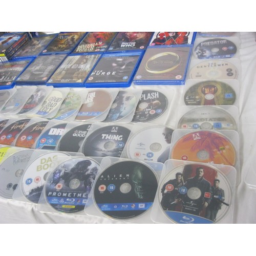 61 - A large assortment of Blue Ray discs, cased, in good order, includes Spiderman boxed sets, plus an a... 