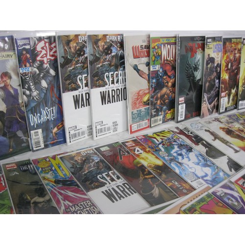 64 - A selection of 50 Marvel comics, mix of new and vintage, all in plastic wraps with cardboard backing... 