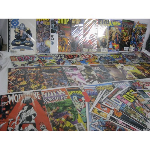 63 - A selection of 50 Marvel comics, mix of new and vintage, all in plastic wraps with cardboard backing... 