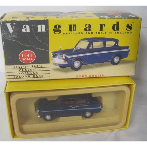 65 - A selection of 1.18 diecast cars two boxed three unboxed in fair condition along with three other di... 