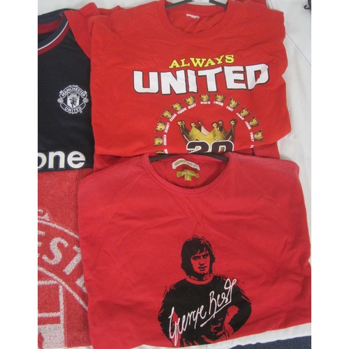 79 - An assortment of Manchester United shirts, mainly souvenir including Treble Winners 1999, a training... 