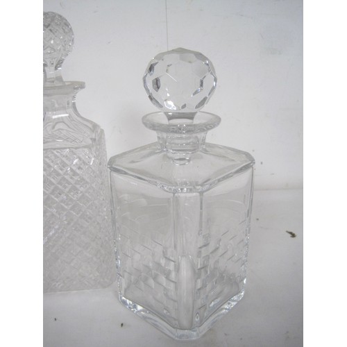 95 - Five decanters - a Waterford slice cut decanter with spire stopper, 33cm, very good; Edinburgh Cryst... 