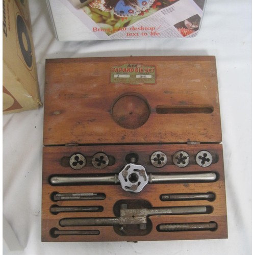 102 - Several interesting items comprising a film editor, a cased tap and die set and a vintage hand-helld... 